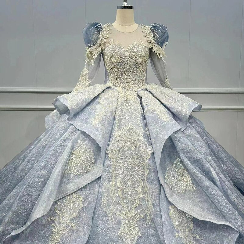 Shiny blue shimmery long sleeve blue wedding dress