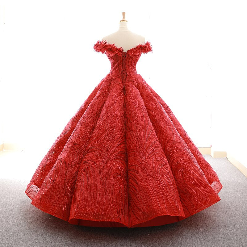 red green and champagne floor length pleat luxury evening dress with feather shoulder