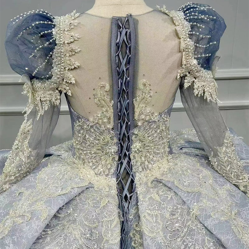 Shiny blue shimmery long sleeve blue wedding dress